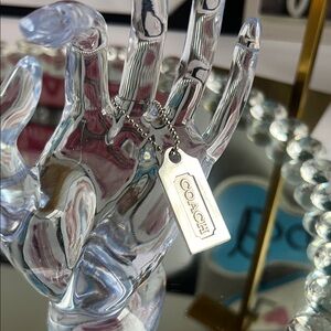 Coach Metallic Silver Tag Pendant